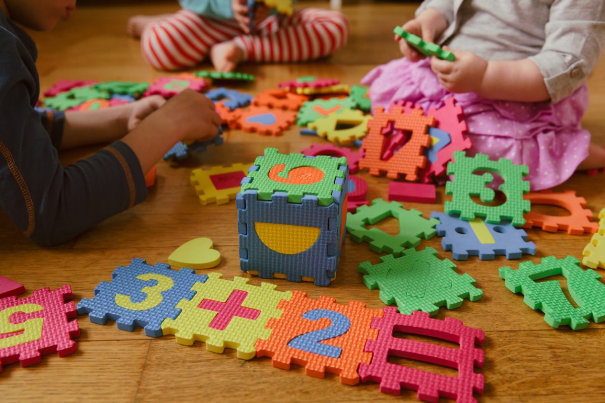 Kids playing with a puzzle