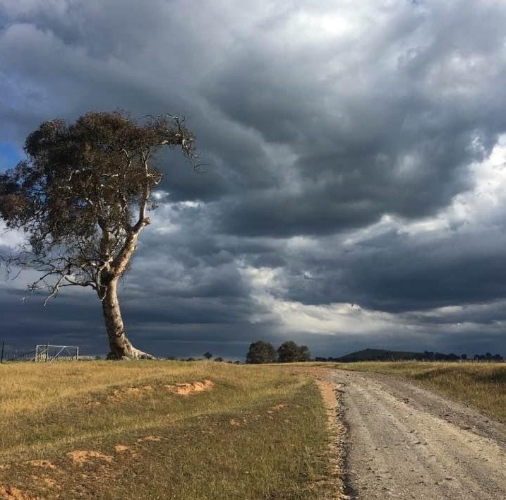 Storm approaching farm