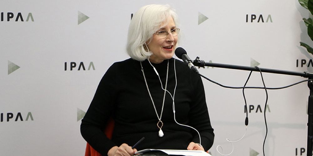 woman speaking at conference