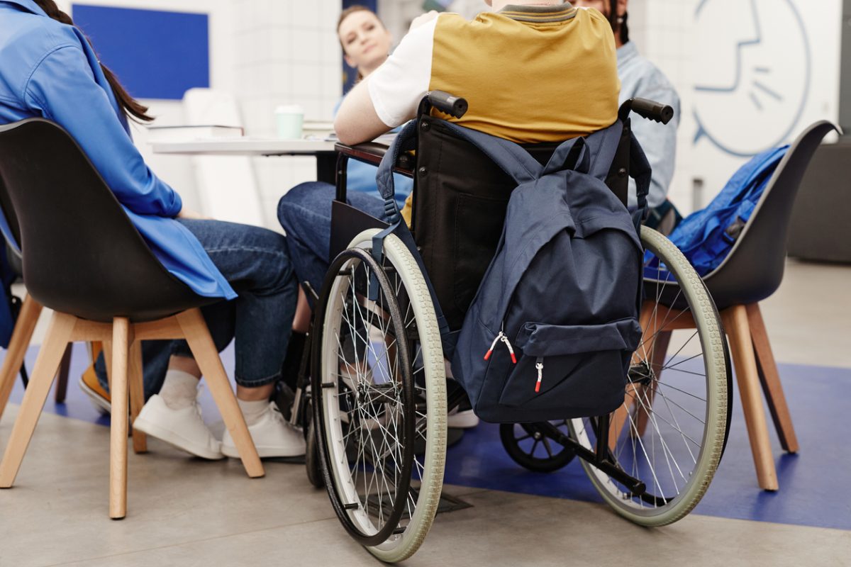 student inn wheelchair at school