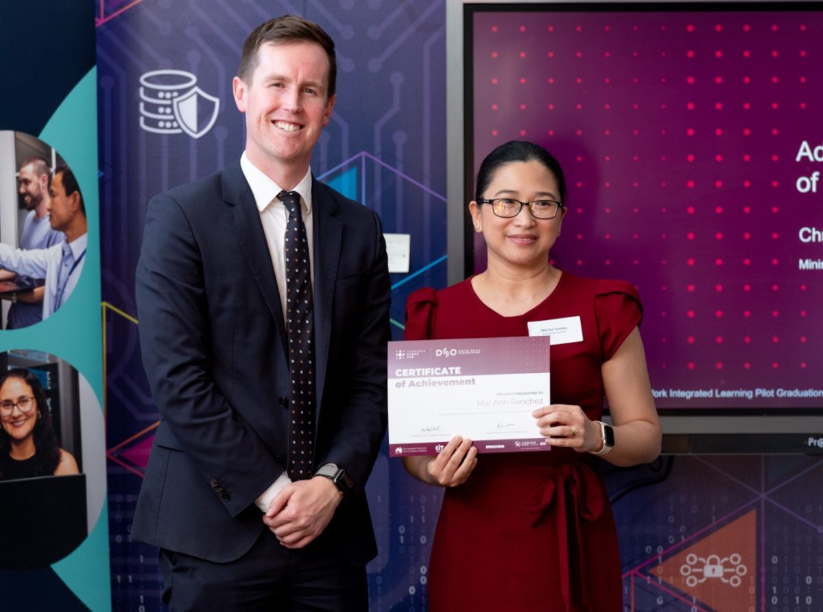 Minister for Skills Chris Steele with Canberra Cyber Hub graduate Mai Sanchez. 