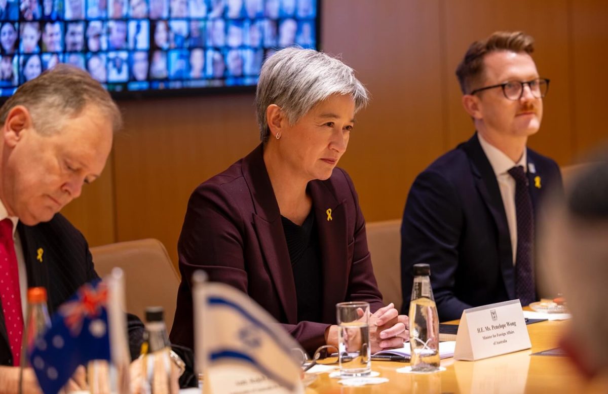 Senator Penny Wong at a meeting