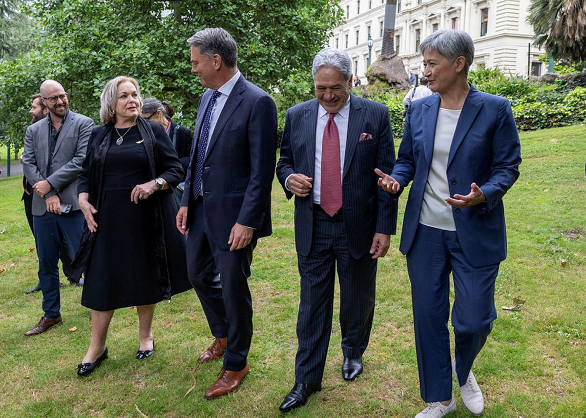 four politicians walking and talking