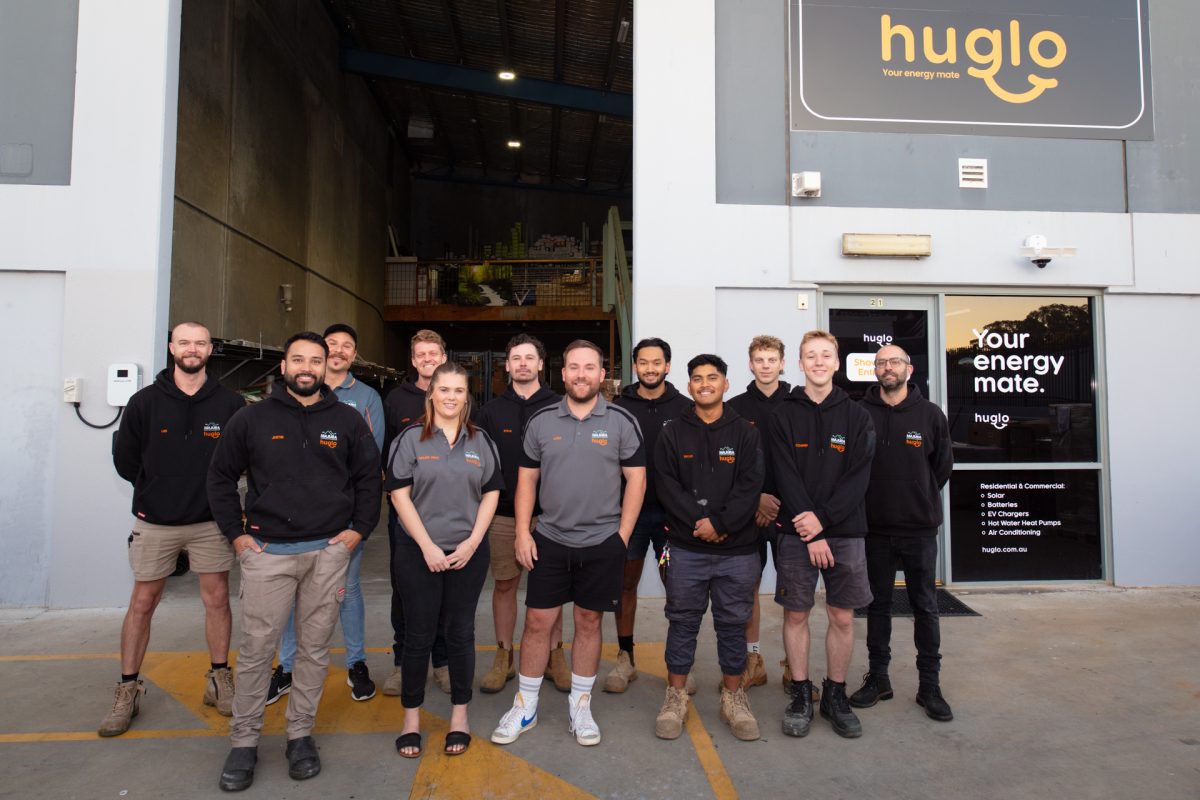 Tim Sturgiss with some of the Huglo team in front of warehouse