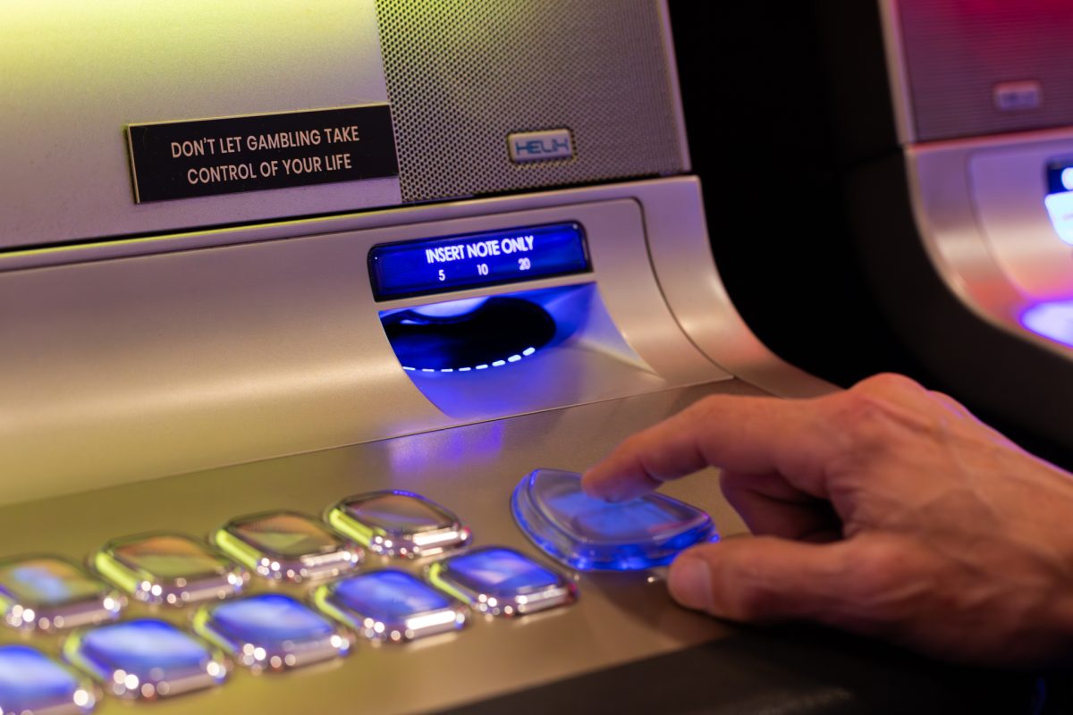 playing a poker machine
