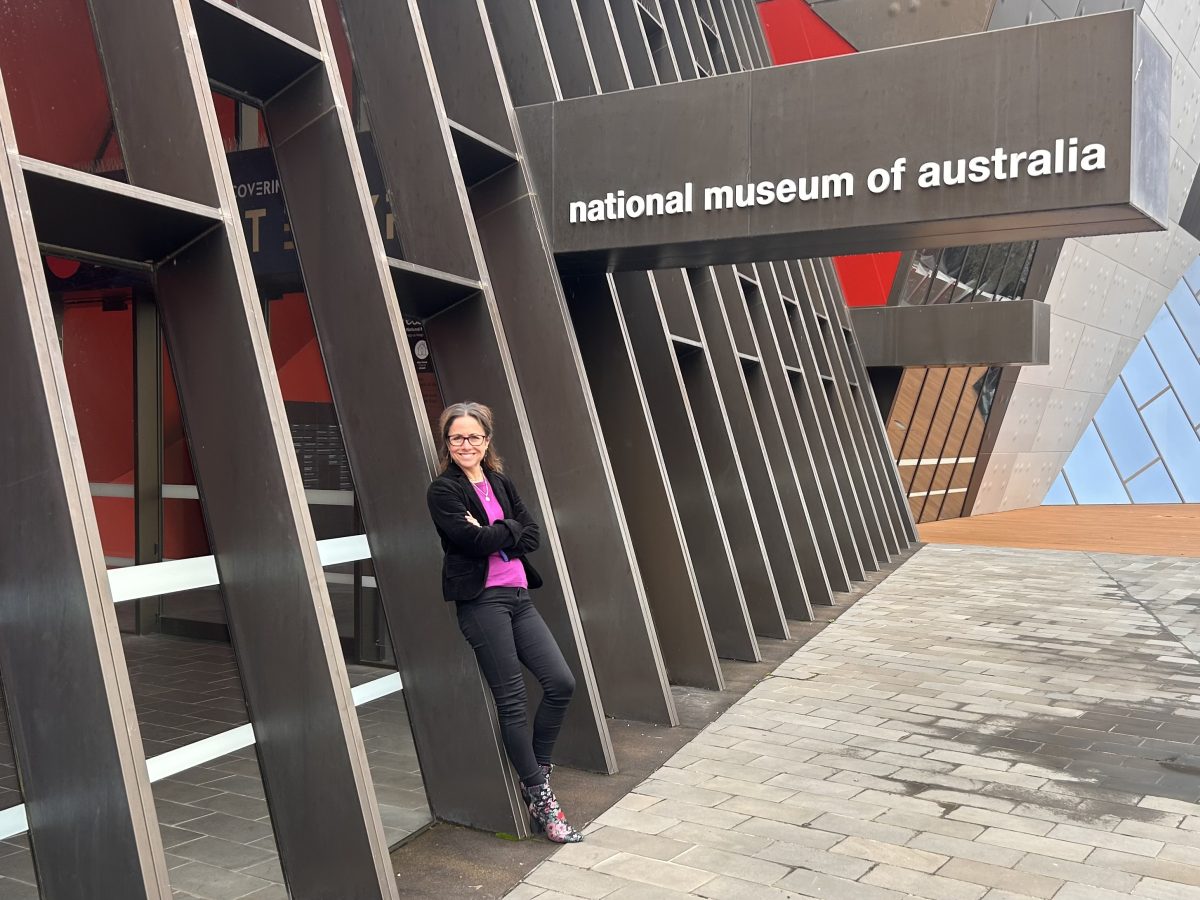 Woman standing outside National Museum of Australia