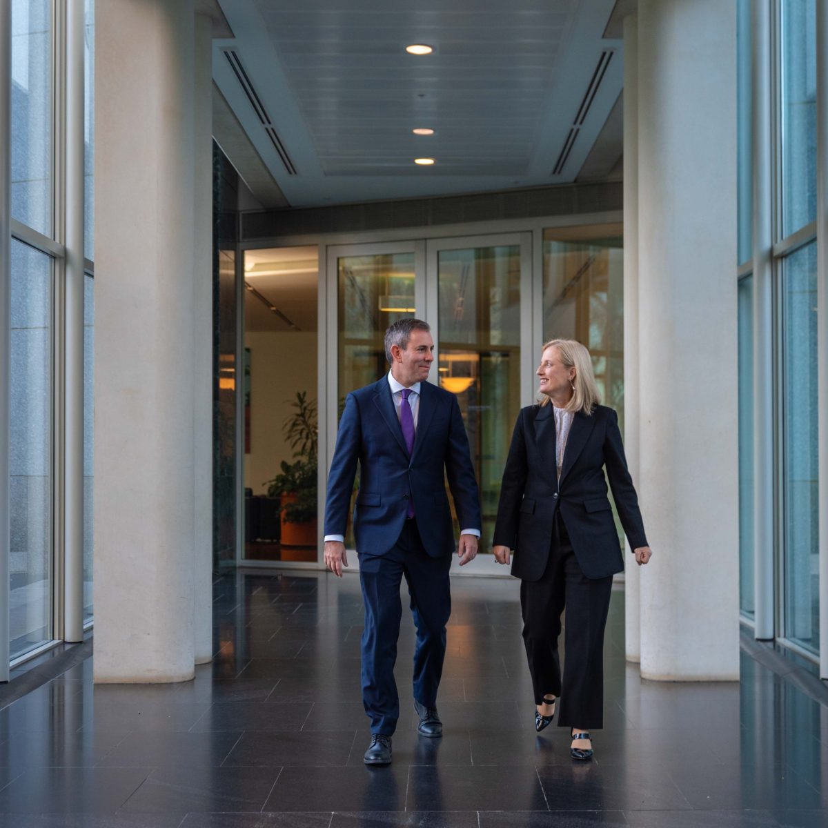 Jim Chalmers and Katy Gallagher walking in Parliament House