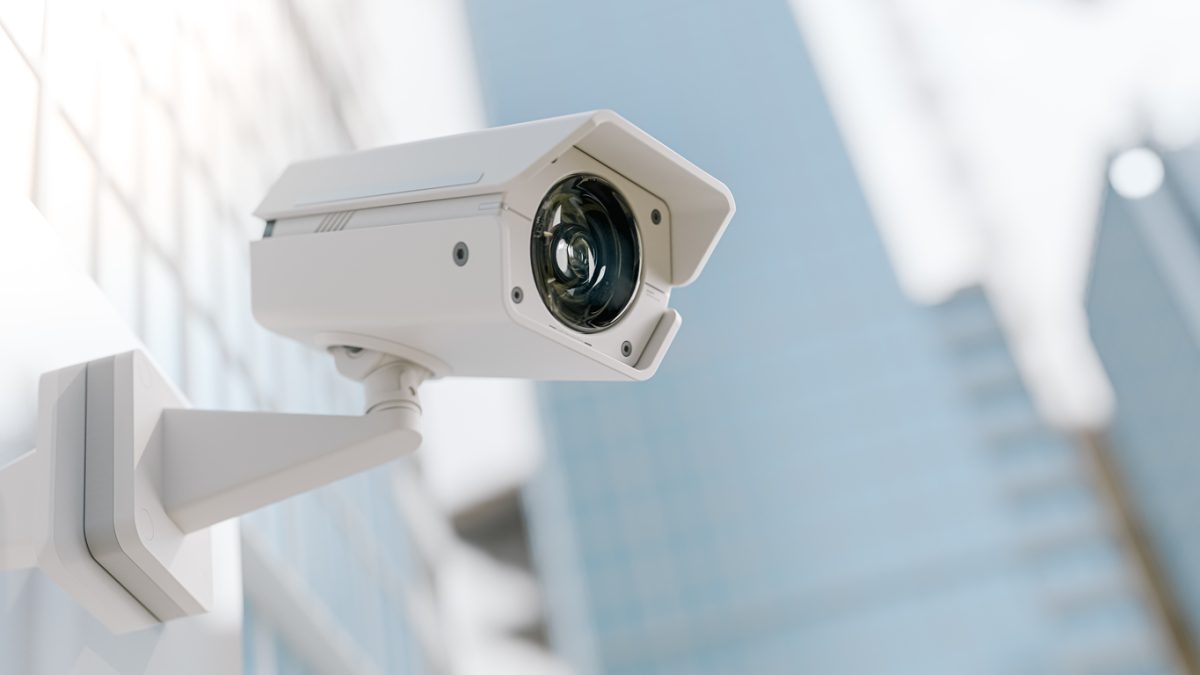 CCTV camera on wall of building
