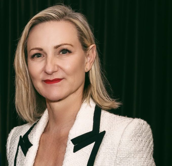 Woman wearing white jacket