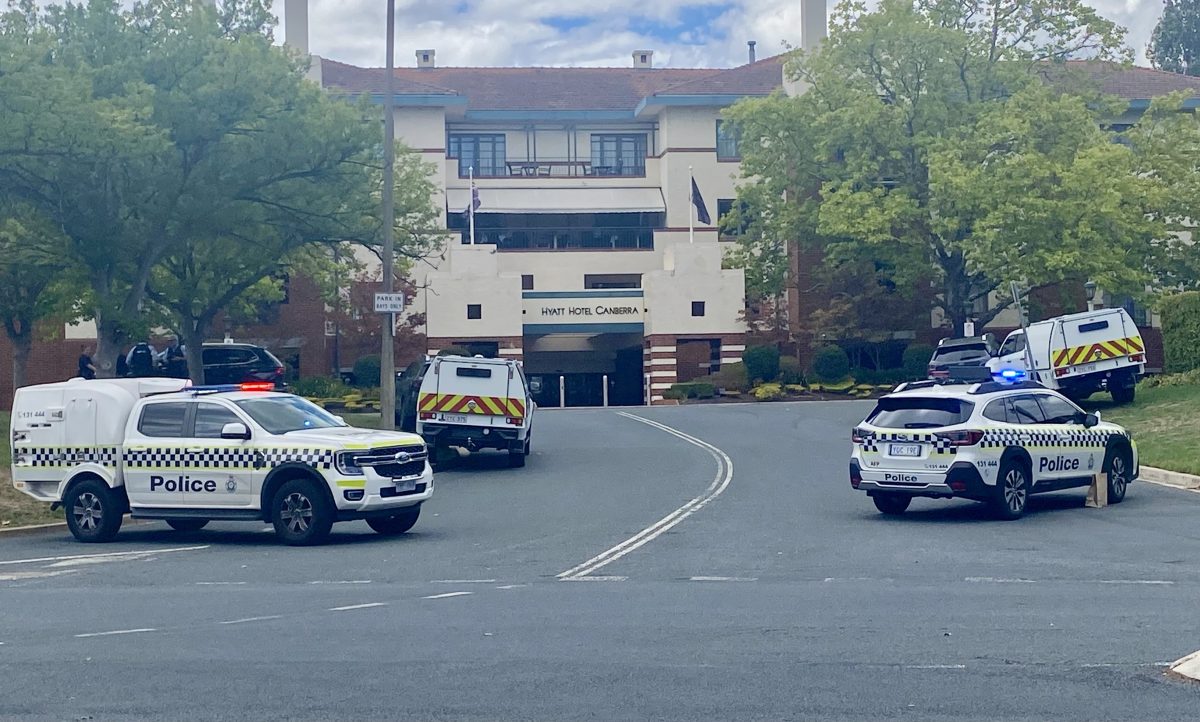 Various police cars outside The Hyatt Hotel