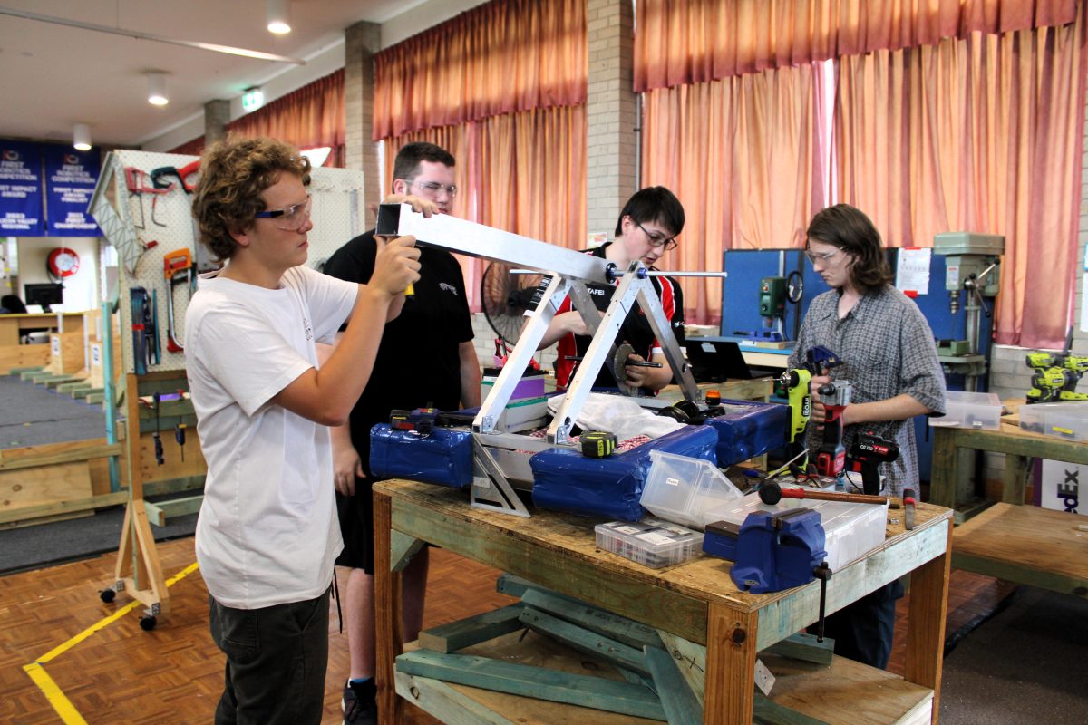 Students working on robot.