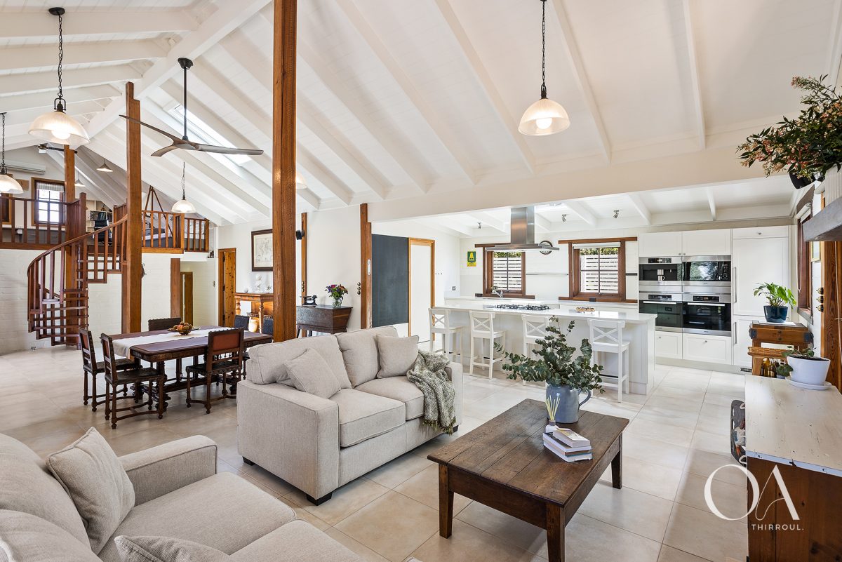 Open plan lounge and dining space at 7a Coast Street in Thirroul