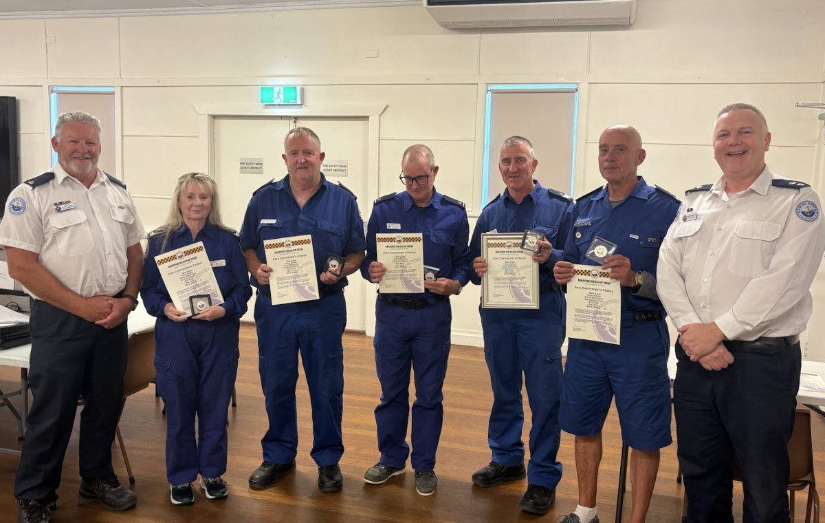 Mark Asper, Trevor Davies, Trevor Williams and Joe Sciancalepore, and radio operators Sue Cook, Rob Rego and Barry Waters were recognised for their rescue of a man from a burning boat earlier this year.