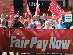 NORTHERN IRELAND: Angry workers want pay not prizes