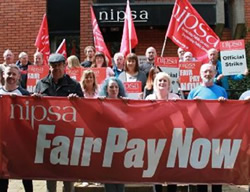 NORTHERN IRELAND: Angry workers want pay not prizes