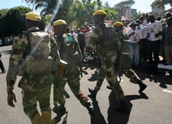 ZIMBABWE: Soldiers force pay cut back-down