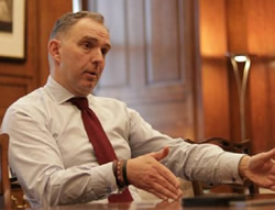 UNITED KINGDOM: Departing head of PS backs reform