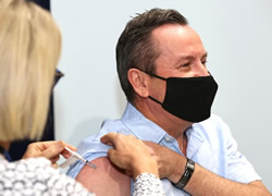 Premier takes lead of vaccination push