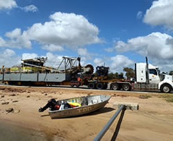 Dredging keeping river entrance open