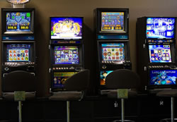 Clubs to cash in on pokies surrender