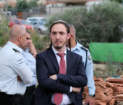 ISRAEL: Status of Minister’s aide questioned
