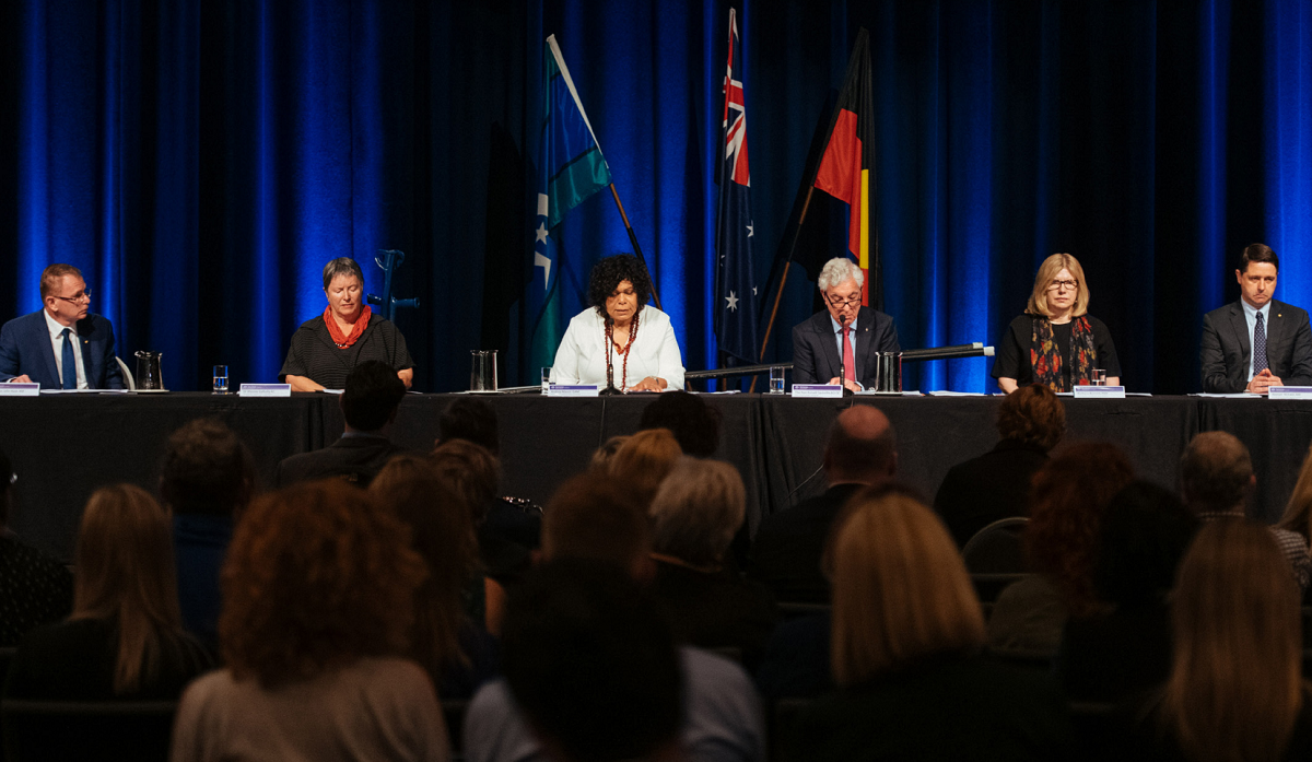 Royal commissioners Mr John Ryan AM, Dr Rhonda Galbally AC, Ms Andrea Mason OAM, chair Mr Ronald Sackville AO KC, Ms Barbara Bennett PSM and Dr Alastair McEwin AM. 