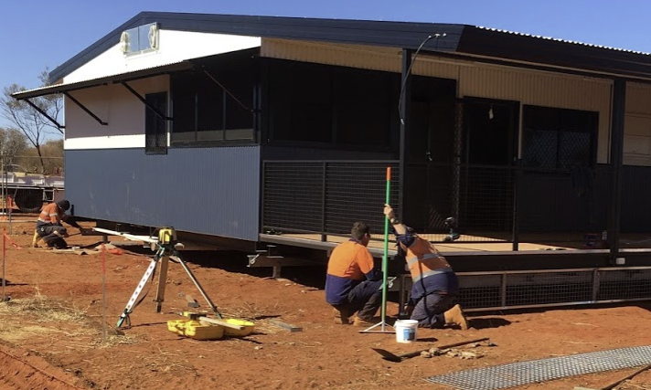 men building a house