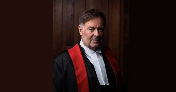 Justice Geason faces abuse charges while government obfuscates over next step