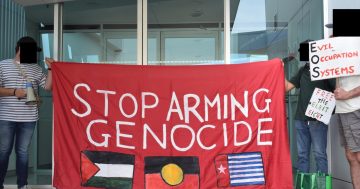 Pro-Palestine group protests at Canberra-based EOS Defence Systems