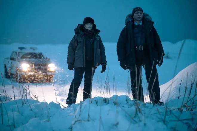 movie scene of two female police officers in snow-covered area
