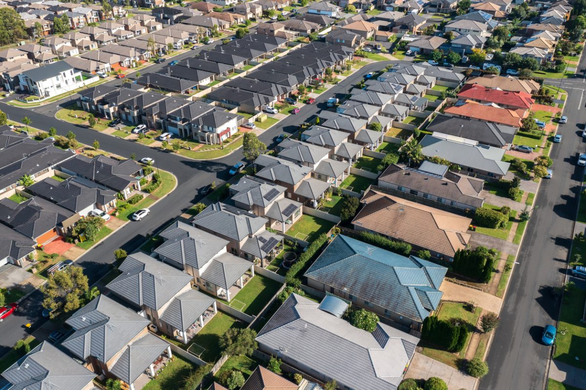 Aerial view of rows of mass-produced ''cookie-cutter''-style homes