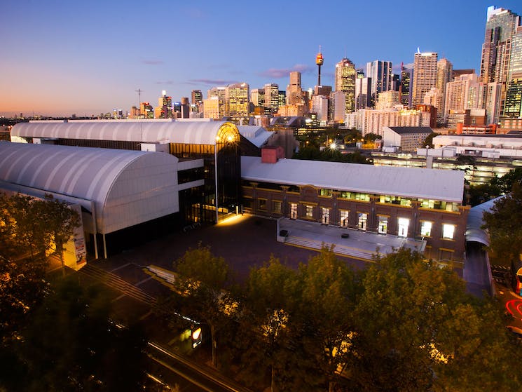Museum building with the Sydney CBD skyline in the background