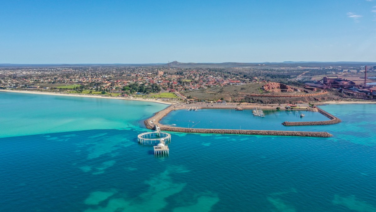 An aerial view of Whyalla above the sea.