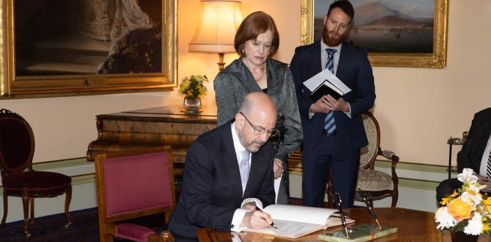 man being sworn in to government appointment