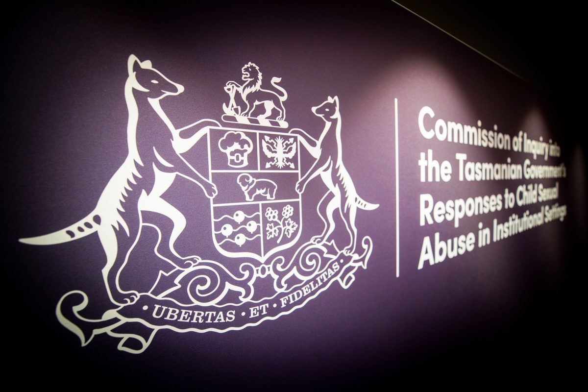 Sign reading ''Commission of Inquiry into the Tasmanian Government's Responses to Child Sexual Abuse in Institutional Settings''