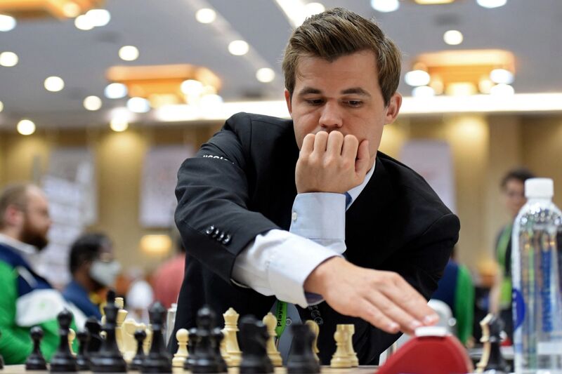 Man playing in chess competition