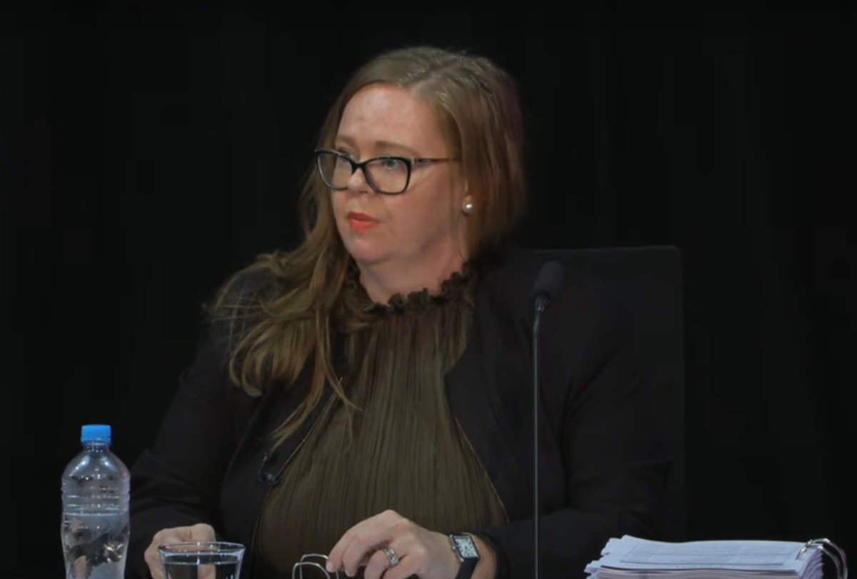 Woman giving evidence at a royal commission