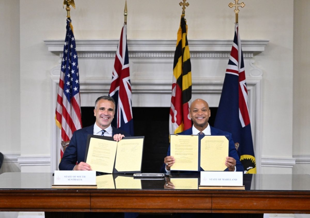 two politicians with signed agreement