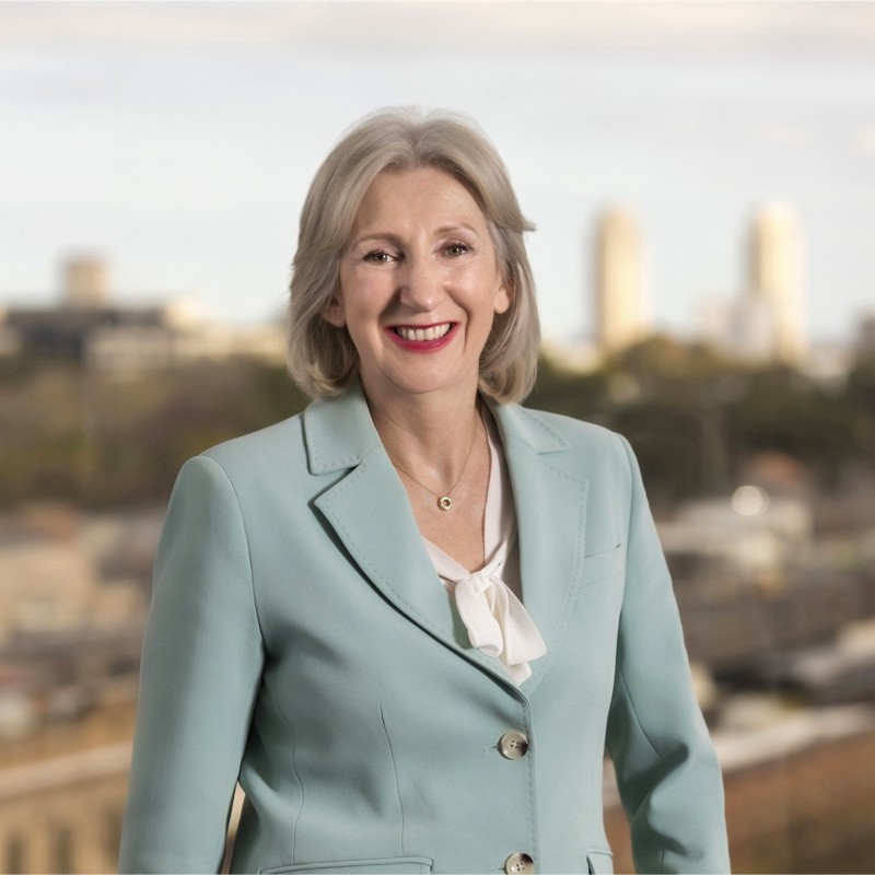 smiling woman in office attire