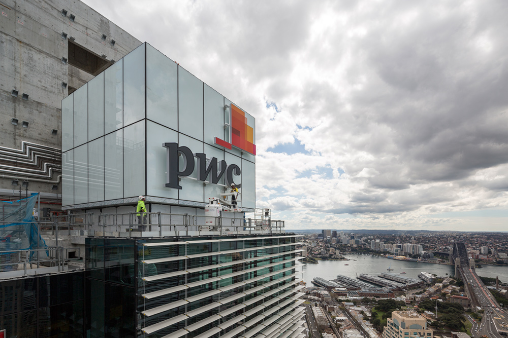 The PWC logo on top of its building in Barangaroo, Sydney.