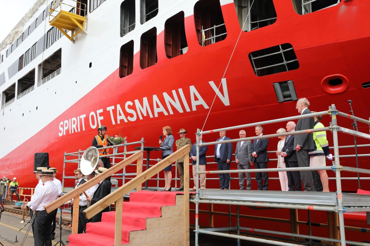 The Tasmanian Governor speaking from a platform beside the new Spirit of Tasmania V hull.