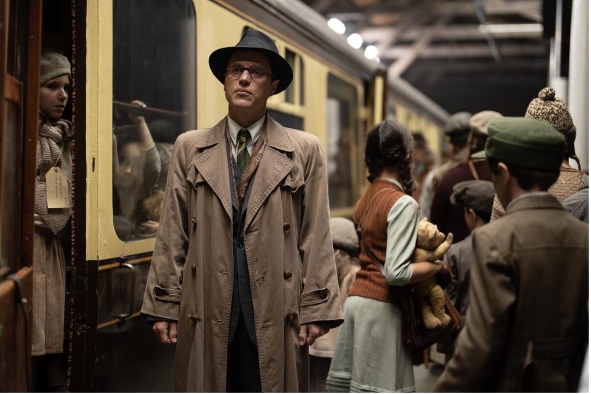 movie scene with people at a train station