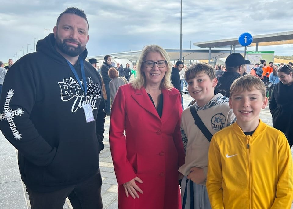 Minister Saffioti standing with RTBU WA Branch Secretary Joshua Dekuyer and two of his kids at the Yanchep opening.