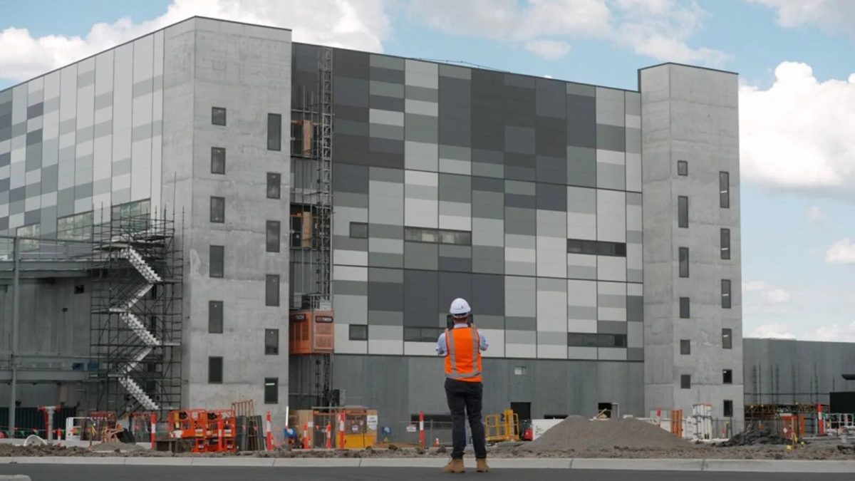 Manufacturing facility with a worker in front