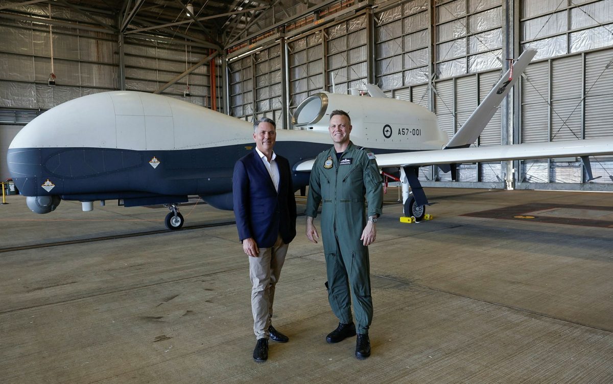 Two men and an ADF aircraft