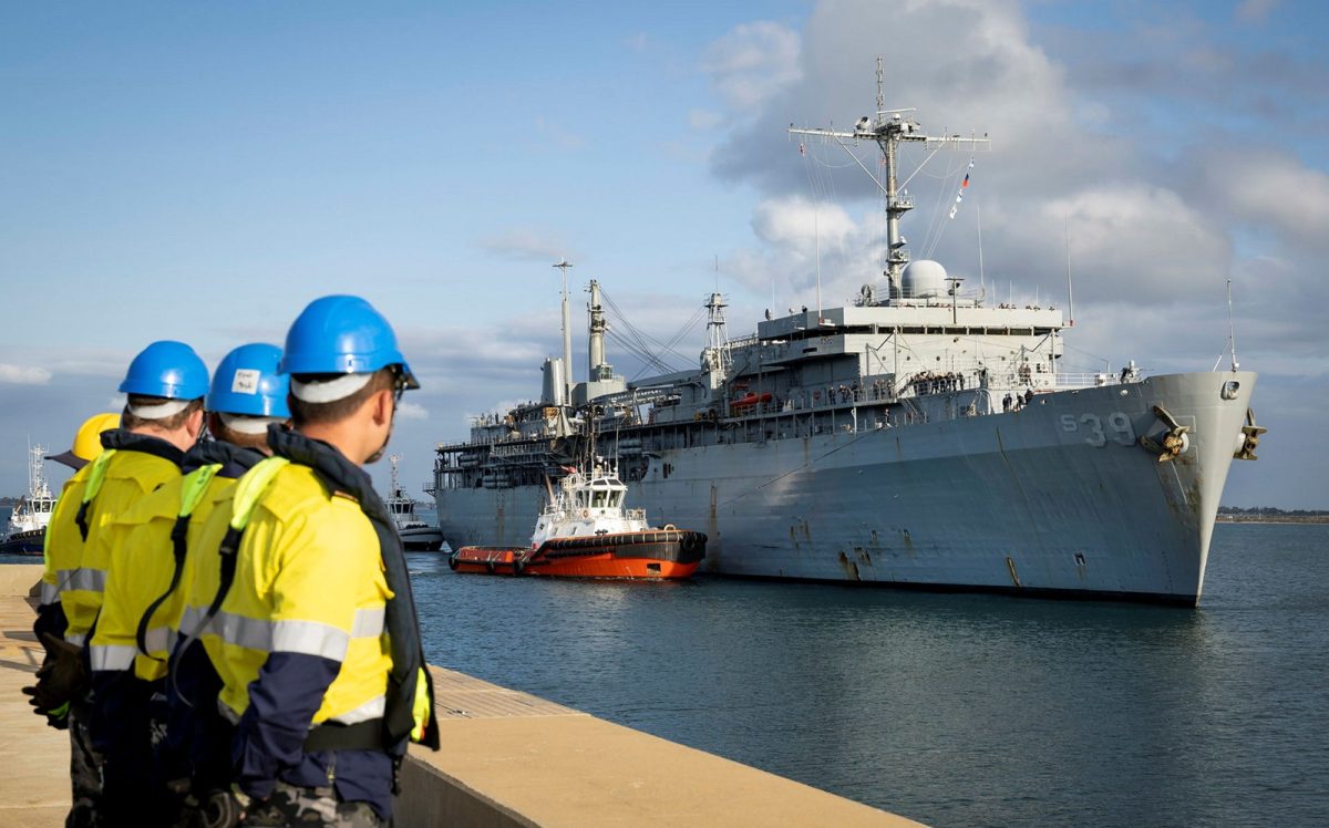 workers awaiting arrival of naval vessel