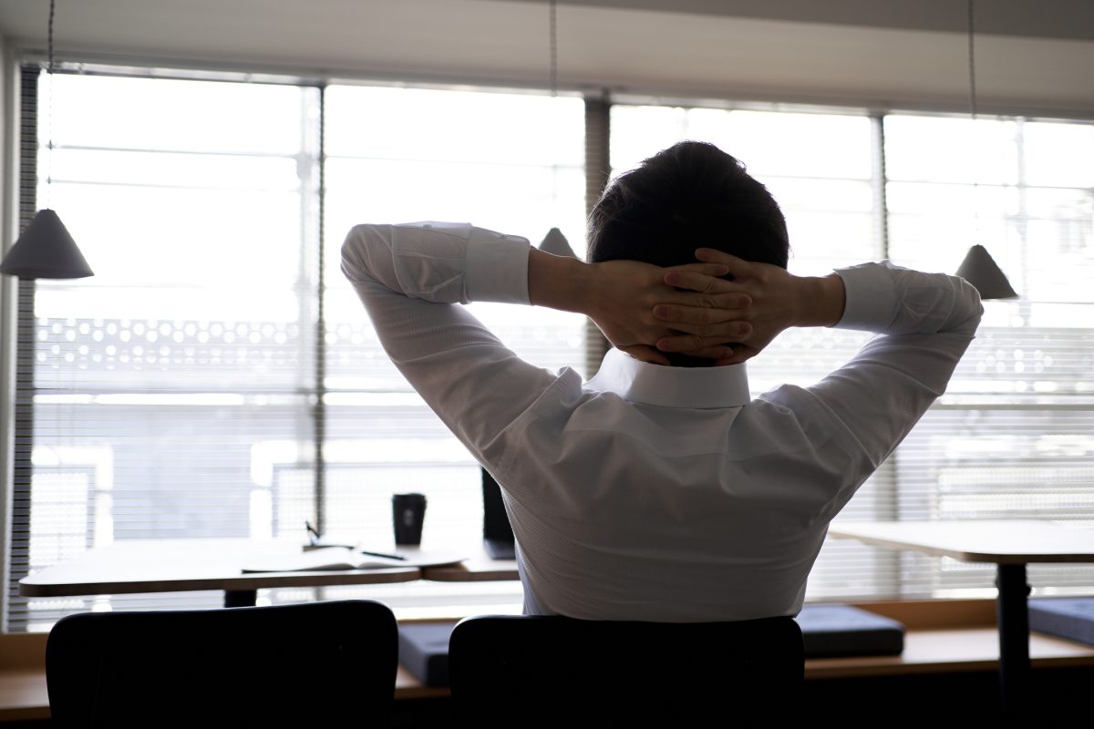 Man relaxing in his office chair