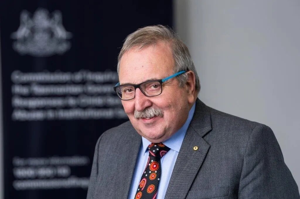 smiling man in a suit