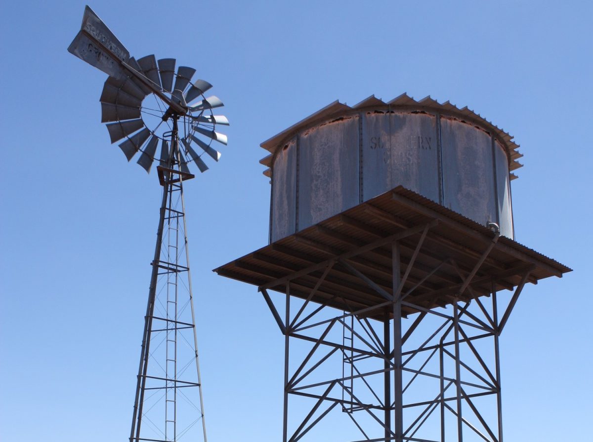 Windmill and water storage tank.