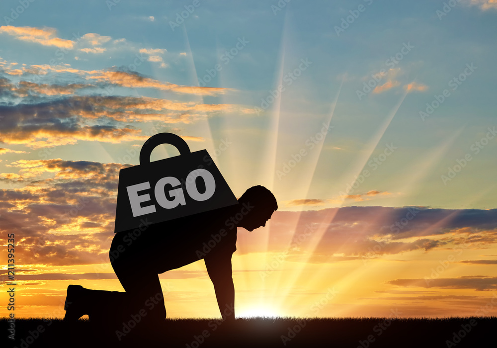 Person crawling under the weight of an ego